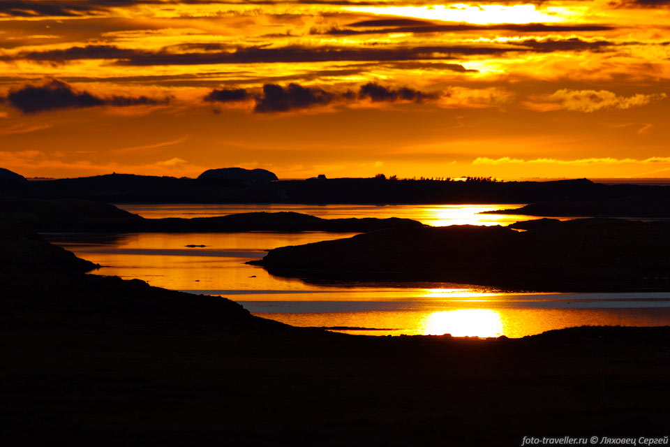 Закат над изрезанной фьордами землей